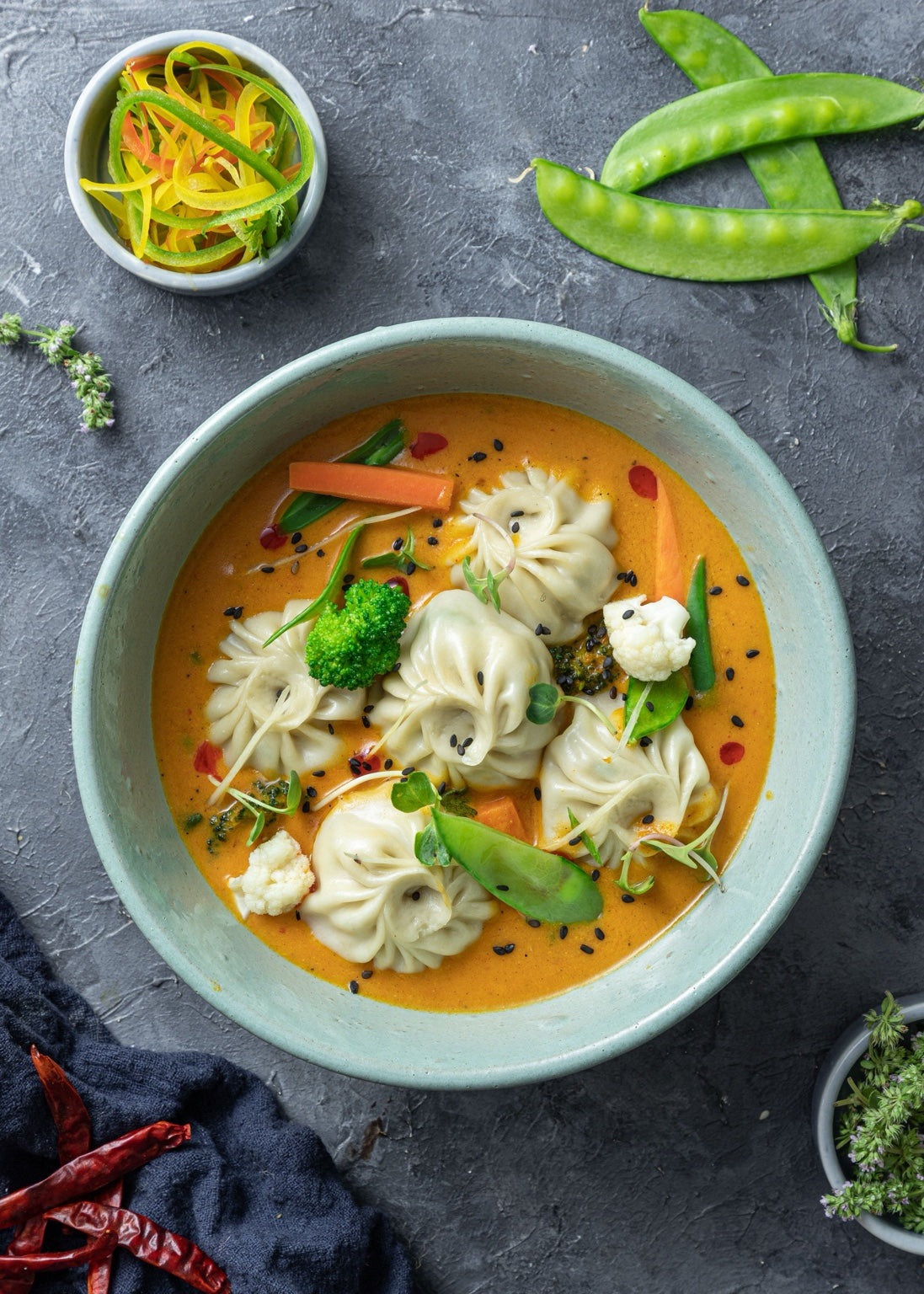 Momos in warm ramen broth